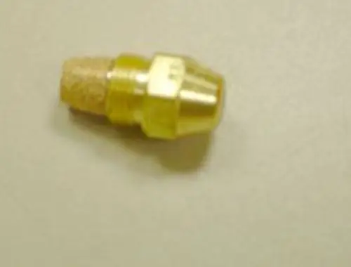 Goldfarbener Messinganschluss mit einem Korkelement, das zur Spritzdüse der Marke Remeha verwendet wird.